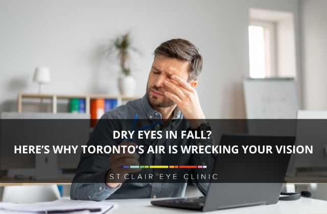 A man rubbing his eyes while working on a laptop, illustrating dry eye symptoms caused by Toronto’s dry fall air — St. Clair Eye Clinic.