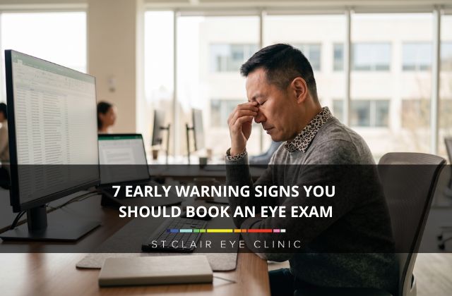 Man experiencing eye strain and headaches while working at a computer, one of the early warning signs that it may be time to schedule a comprehensive eye exam